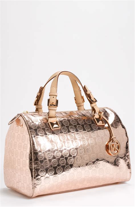 michael kors rose gold shiny pouch|michael kors purses for women.